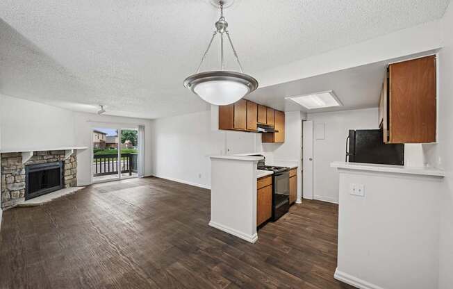 Reflections at Cherry Creek in Aurora, CO kitchen and living room