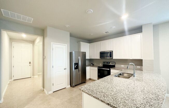 Bright & Roomy 5 Bedroom, 2.5 Bathroom Home with 2-Car Garage