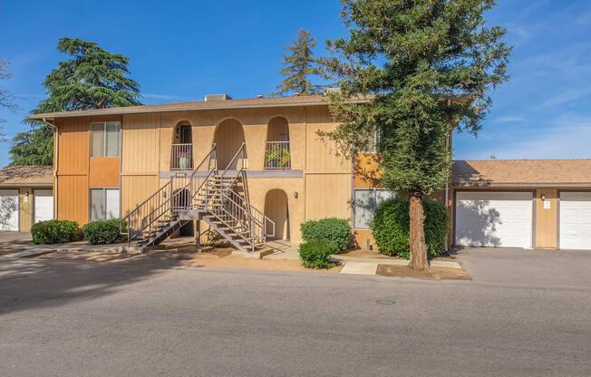 a close up of a street in front of a house