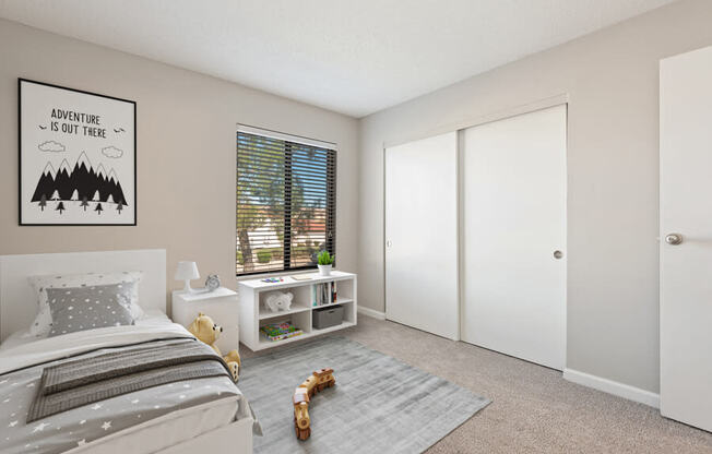 Model apartment bedroom with a bed and a window at Saratoga Ridge, Phoenix, 85022