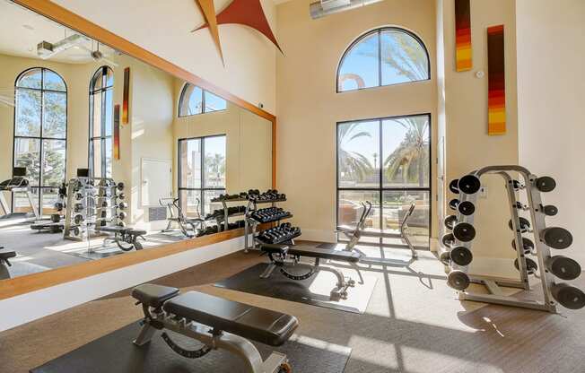 the preserve at ballantyne commons fitness center with exercise equipment and windows