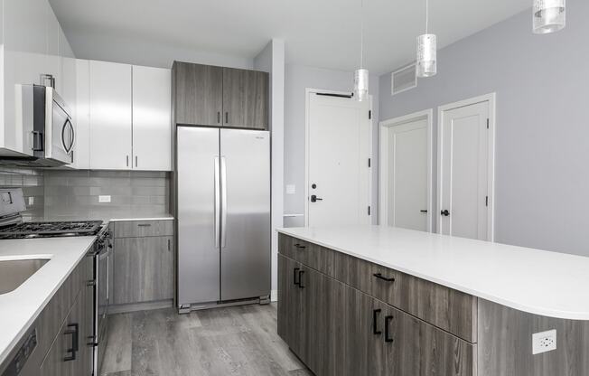 a kitchen with stainless steel appliances