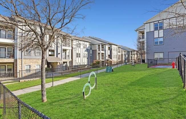 the preserve at ballantyne commons yard with grass and apartment buildings