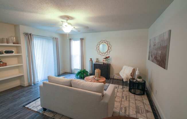 Photo of the living room in a 692 square foot 1 bed, 1 bath model aprtment at Cambridge Court Apartments in Dallas Texas