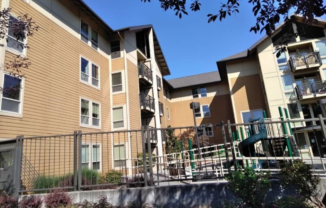 a picture of an apartment complex with a slide