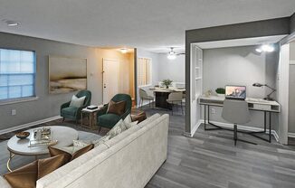 a living room with a couch and a table