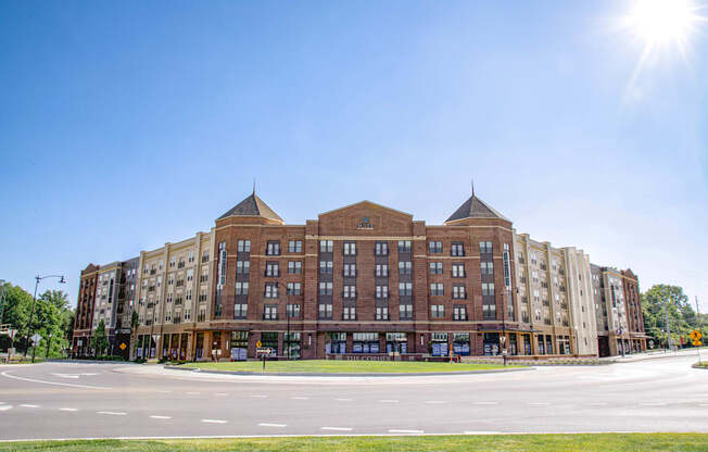 a large building with a street in front of it