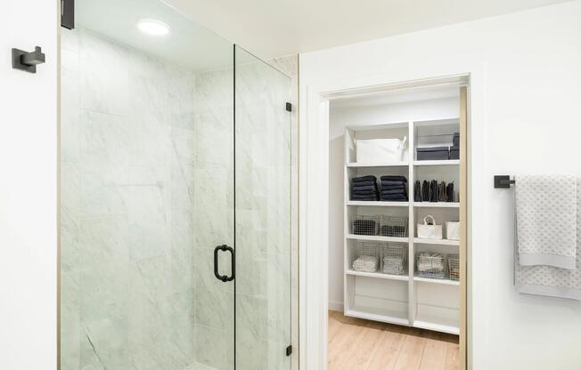 Spa-inspired finishes and smart storage solutions in this North Tower home —every detail shines.