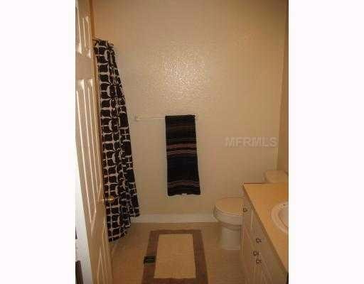 Well maintained condo, water included, in a GATED COMMUNITY with community POOL at heart of new Tampa