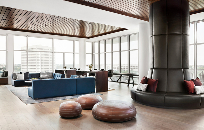 Sky High Resident Lounge with Circular Seating and Floor to Ceiling Windows