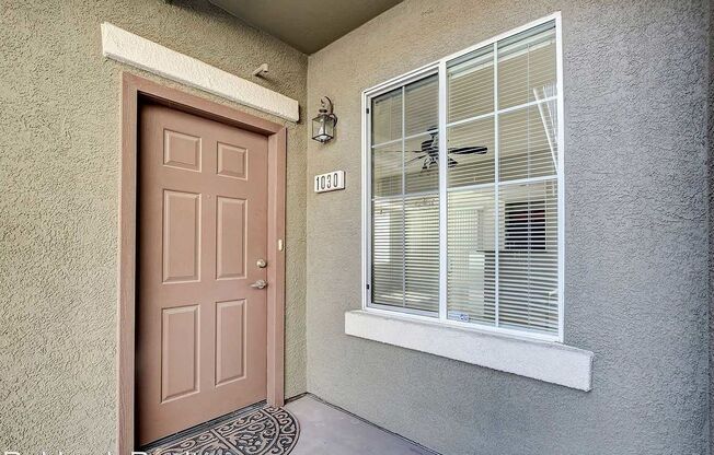 STUNNING LOWER‐LEVEL ONE BEDROOM, ONE BATH CONDO WITH DIRECT ACCESS ATTACHED GARAGE IN THE SOUGHT‐AFTER SKY POINTE COMMUNITY!