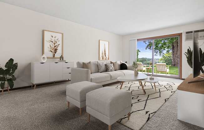 A living room with a grey rug and a white sofa.