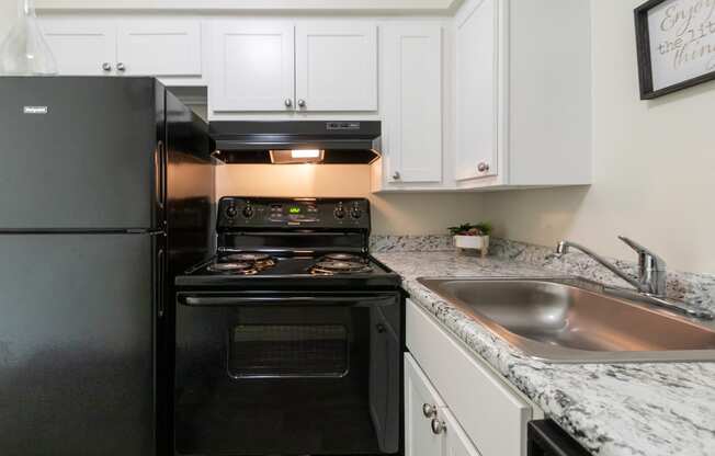 This is a photo of the kitchen in a 560 square foot, 1 bedroom, 1 bath apartment at Aspen Village Apartments in Cincinnati, OH.