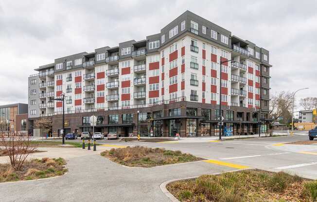 A large building with a red and white checkered pattern on the side.