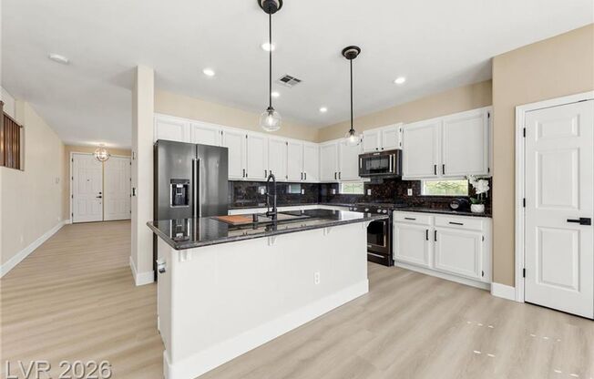 Spacious Henderson Home with Loft, 3-Car Garage & Covered Patio