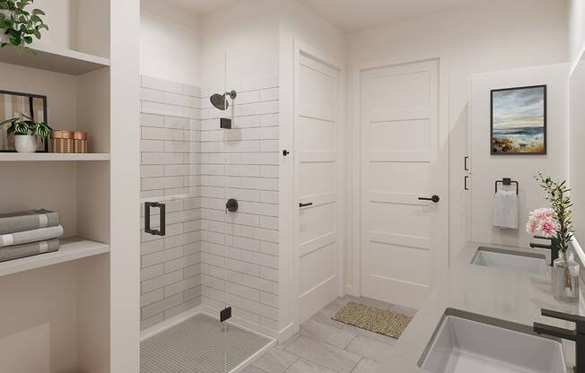 a white bathroom with a shower and a sink