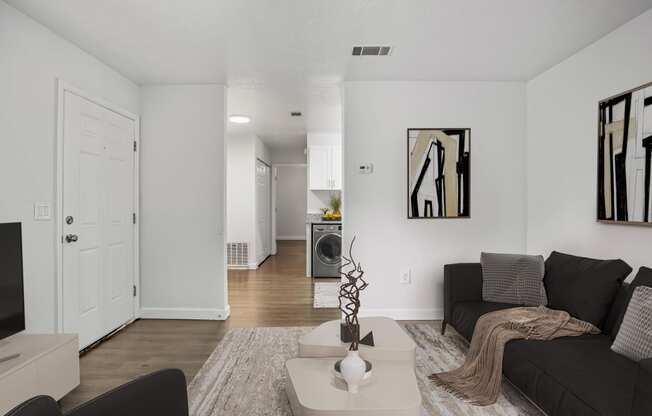 a living room with a couch and a coffee table