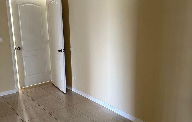 Spacious 3-Bed + Den Home with 2-Car Garage in NE Cape Coral. Special Offer! Qualify for a deposit-free option and save on move-in costs!