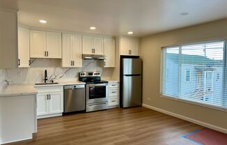 Light, bright & all NEW inside. Beautiful upgrades in this pretty 2 bd, 1 ba unit with a big garage.