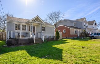 **RENOVATED COTTAGE IN THE NATIONS WITH AN ABSOLUTELY AMAZING FULLY FENCED BACKYARD**