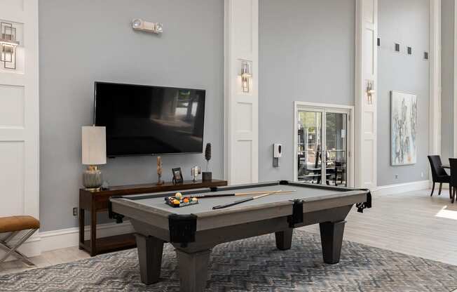 Weston Point Apartments - Clubhouse with billiards table