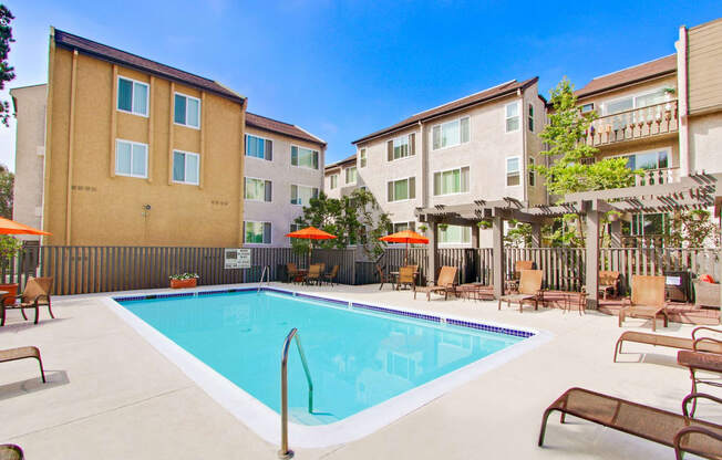 Courtyard resort-style swimming pool, lounges, picnic area on the side