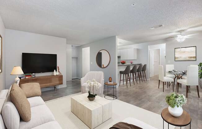 a living room and dining room with a couch and a table