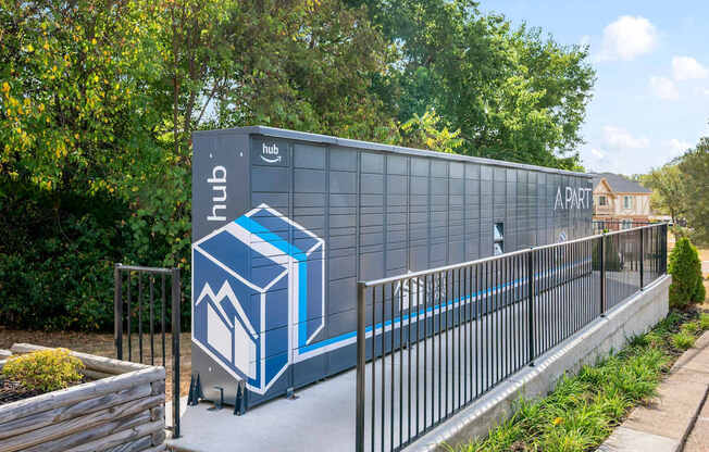 A modern building with a blue and white logo on it.