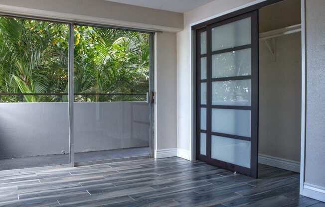 Napili Towers bedroom with closet and glass doors to the balcony