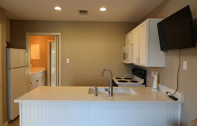 PEARL WEST CAMPUS - LOFTED 2BD / 1 BA - GATED - COVERED PARKING - WATER PAID