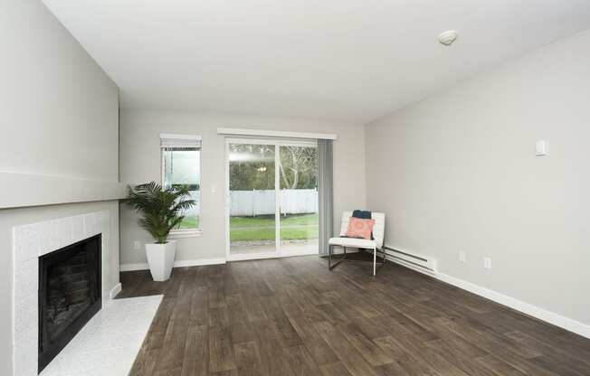 Novela Apartments Living Space Slider Door to back yard