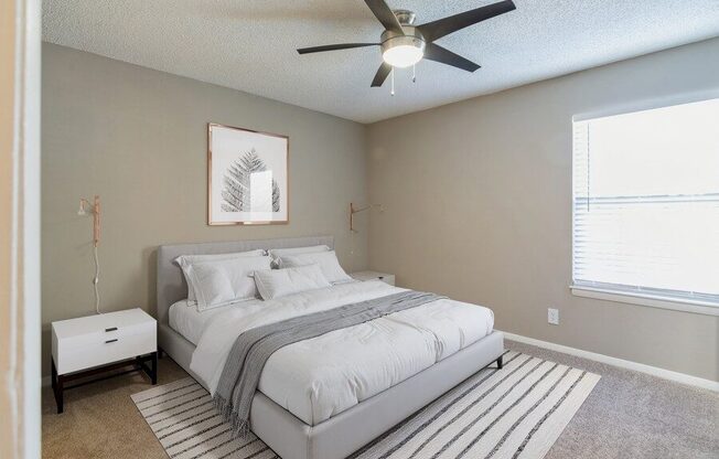 Model bedroom with ceiling fan