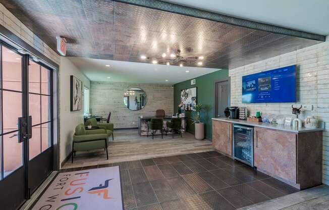 fusion fort worth leasing office interior with coffee bar and modern rustic decor