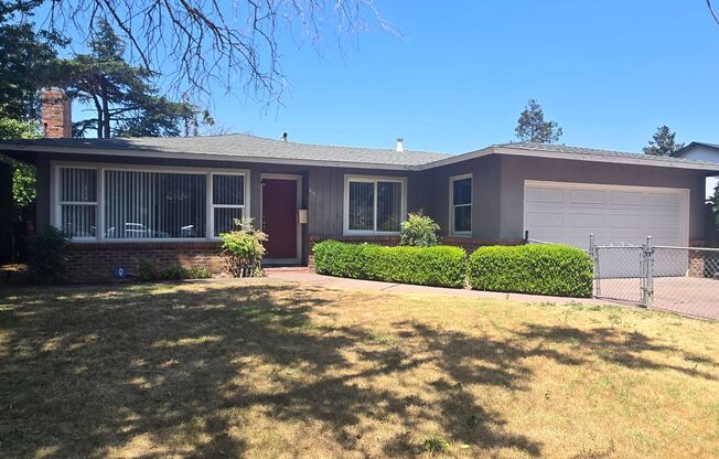 Cute Single Family Home with Large Bonus Room, Updated Kitchen, Wood Floors, Fresh Paint, Nice Yard!