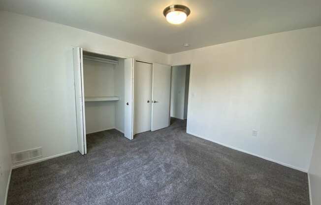 Spacious Bedroom with closets at Gale Gardens Apartments