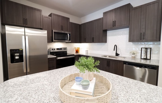 The Crest at South Point 1 Bed Model Apartment Kitchen located in McDonough, GA