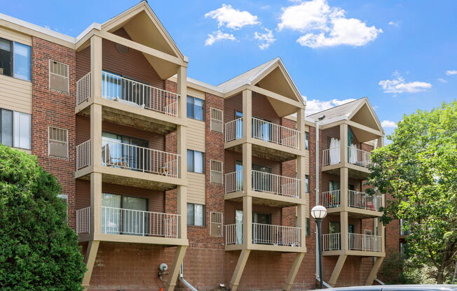 an exterior view of an apartment building with balconies