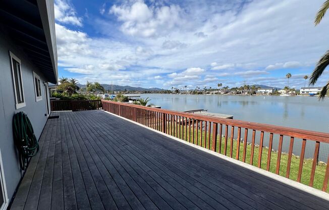 WATERFRONT HOME IN BEL MARIN KEYS WITH BOAT DOCK, FENCED YARD.