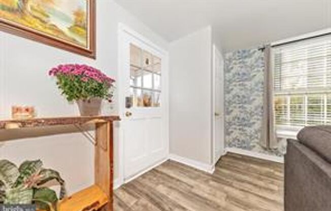 Welcome to this beautifully maintained and move-in ready historic home!