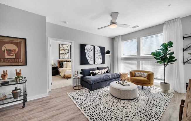 a living room with a couch and a table