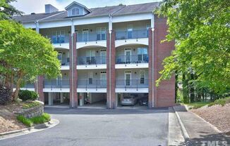 Inviting, modern two bedroom with garage parking, balcony views and a wonderful location in Chapel Hill