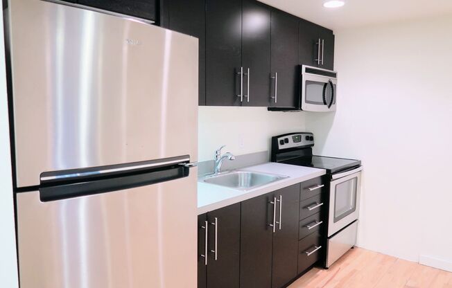 Experience the best of Seattle living at 2111 N 63rd in the sought out neighborhood of Greenlake!