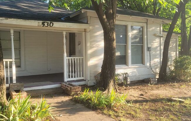 1/1 in historic home with a shared porch and yard.