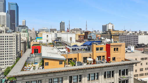 A cityscape with buildings of various heights and architectural styles.