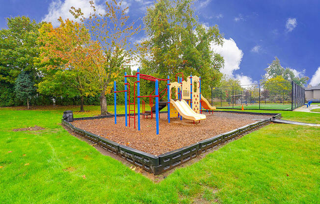 Apartments in Canby OR - Township - Grassy Courtyard with a Playground