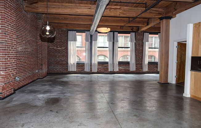 Live in the Heart of the Downtown Loft District! Dorsa Lofts #402