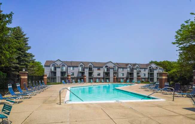 Outdoor Pool with Large Sundeck at Green Ridge Apartments, Michigan 49544