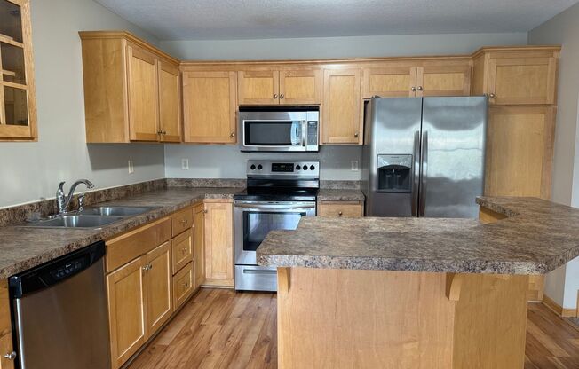 Spacious 3BR / 3BA Townhome with 2-Car Garage – Available Mid-March!