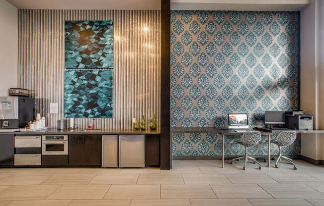 the lobby of a hospital with a desk and a computer at Volare at the Woodlands, The Woodlands, TX
