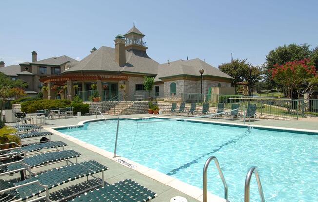 a large pool of water in front of a building